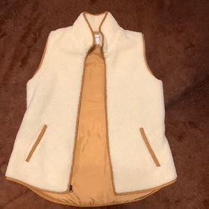 Old Navy off white Sherpa vest with camel colored accents. Size M.